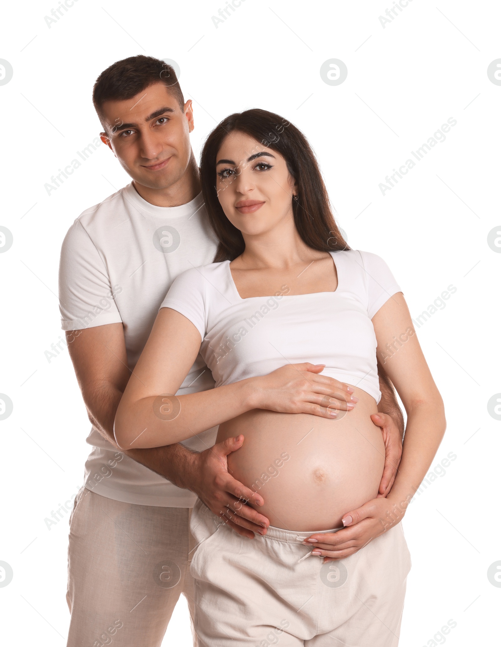 Photo of Beautiful pregnant woman with her husband isolated on white