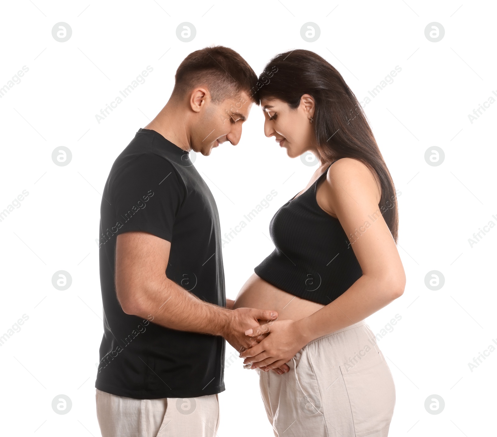 Photo of Beautiful pregnant woman with her husband isolated on white