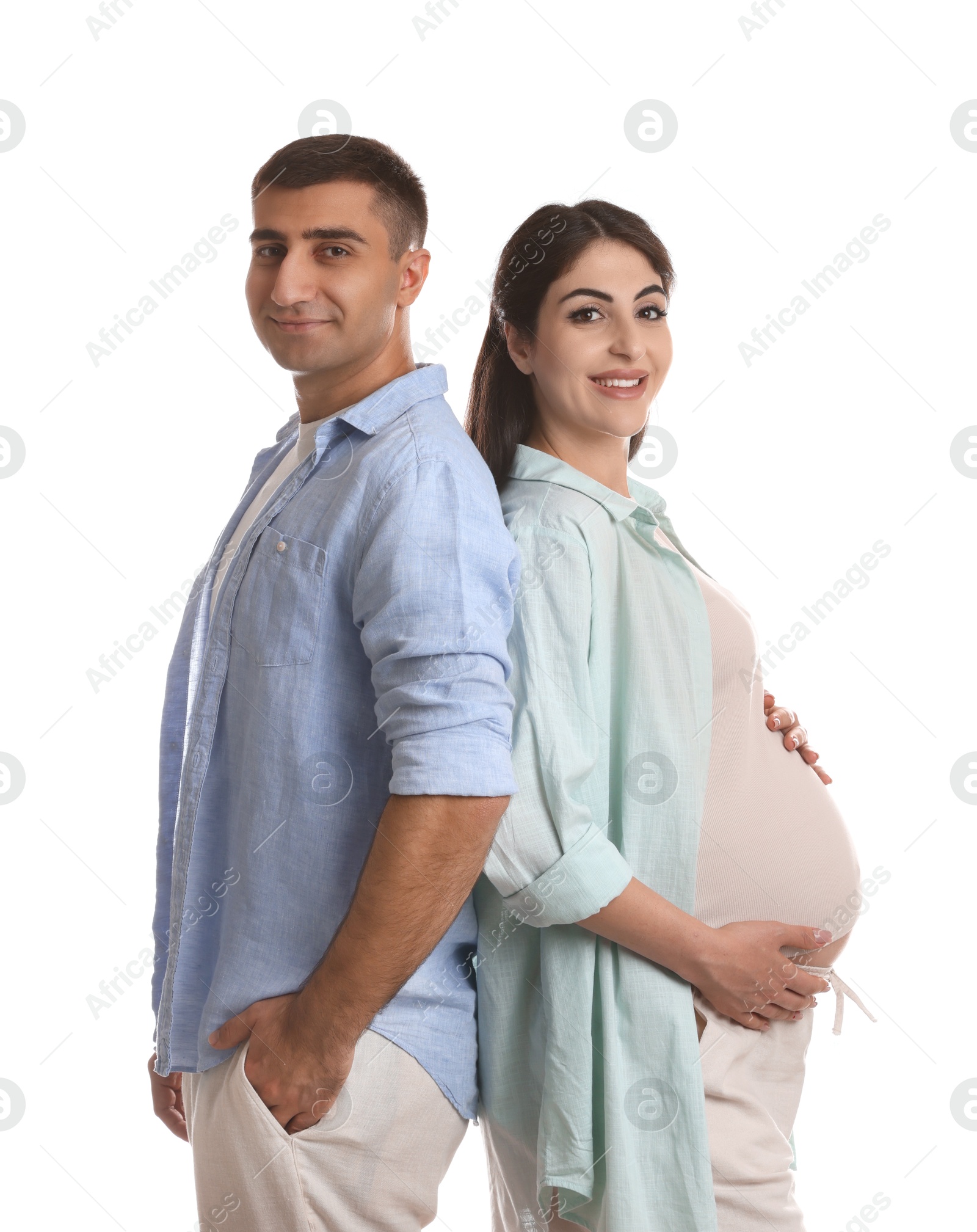 Photo of Beautiful pregnant woman with her husband isolated on white