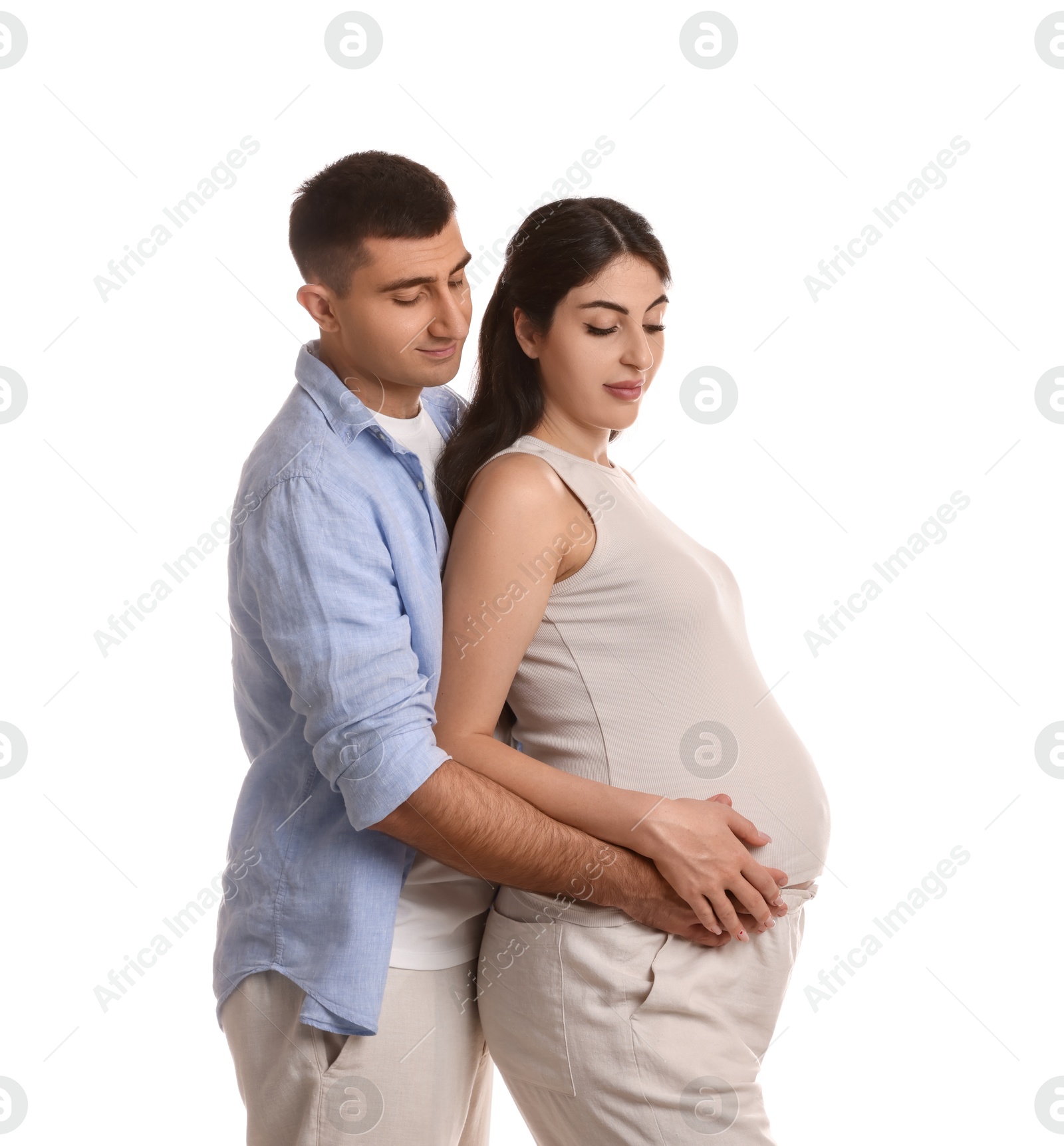 Photo of Beautiful pregnant woman with her husband isolated on white