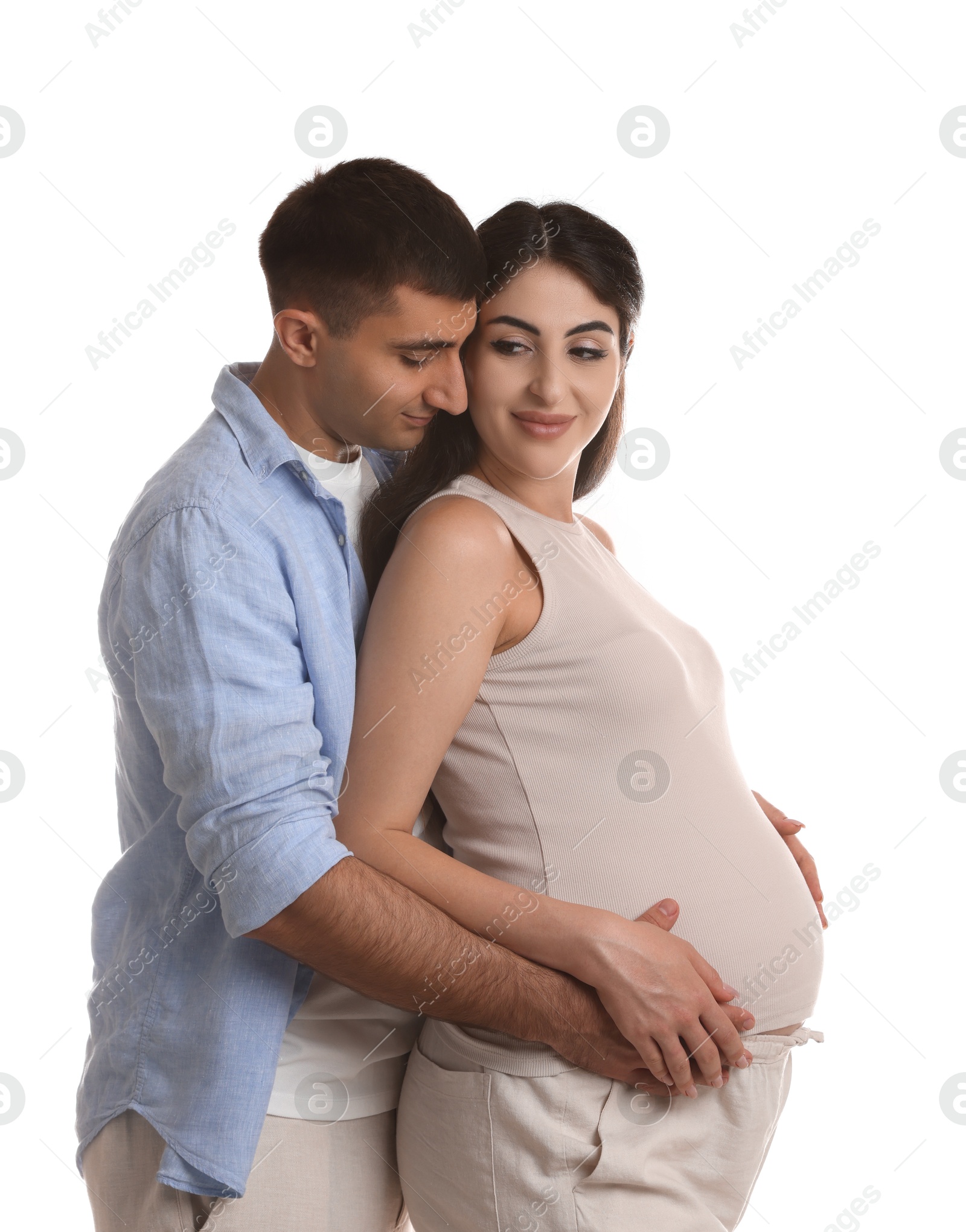 Photo of Beautiful pregnant woman with her husband isolated on white