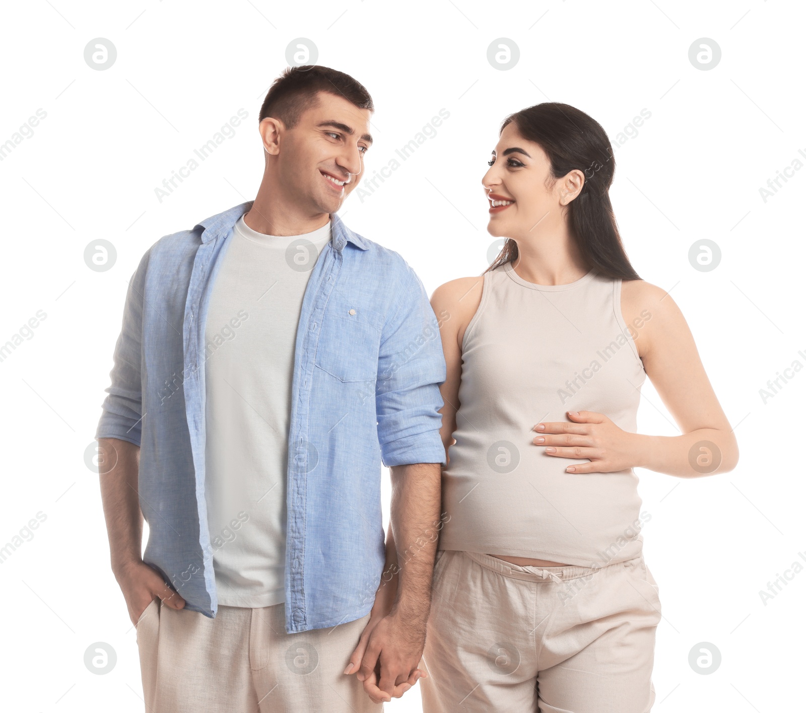 Photo of Beautiful pregnant woman with her husband isolated on white