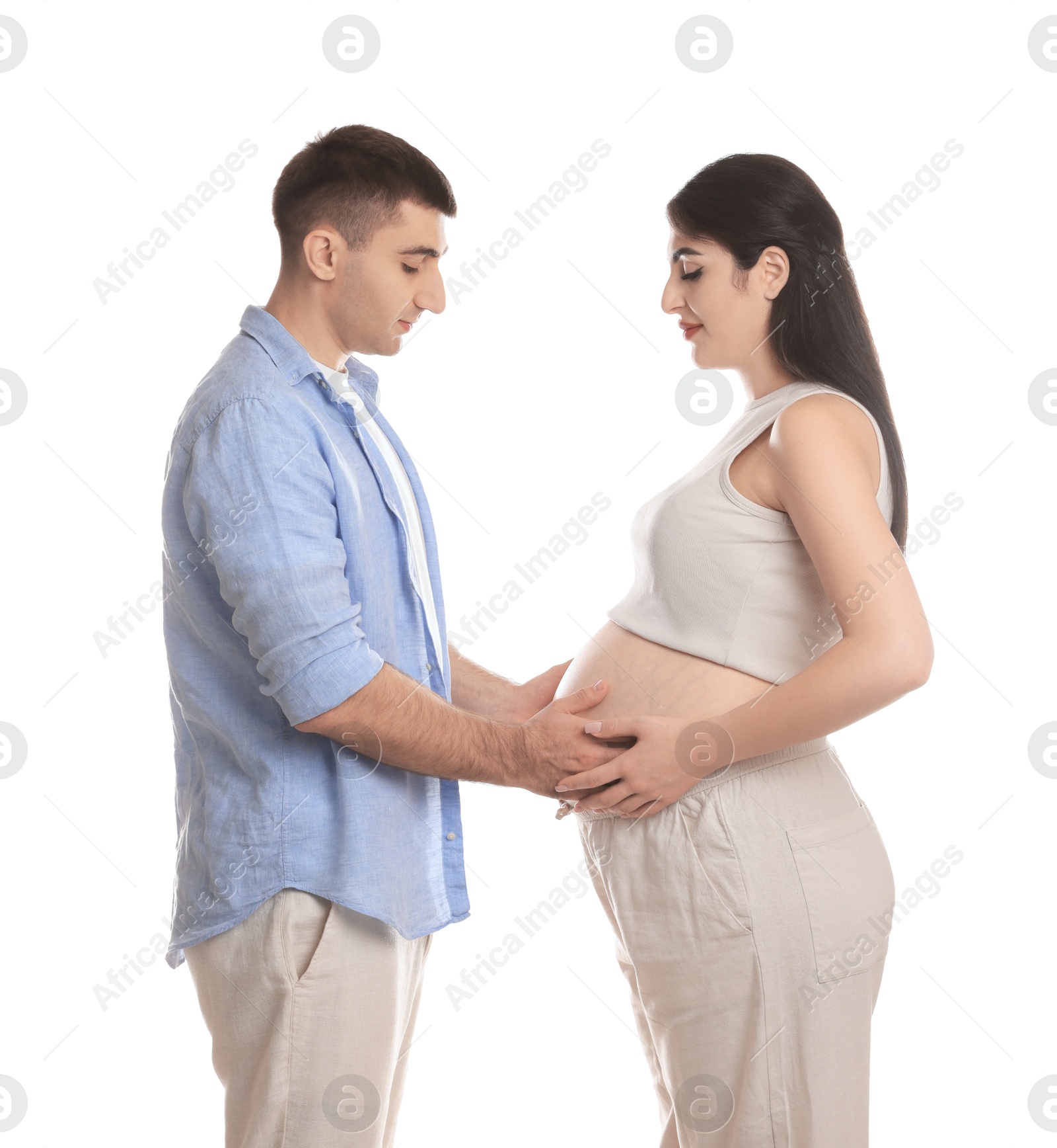 Photo of Beautiful pregnant woman with her husband isolated on white