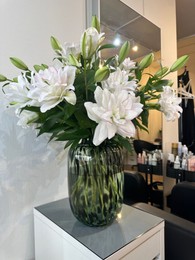 Bouquet of beautiful flowers on table indoors