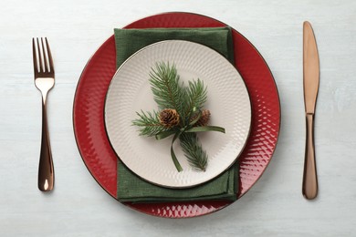 Photo of Christmas table setting with festive decor, flat lay