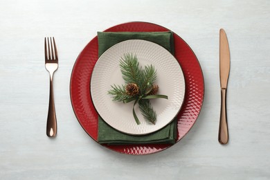 Photo of Christmas table setting with festive decor, flat lay