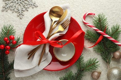 Photo of Christmas table setting with festive decor, flat lay