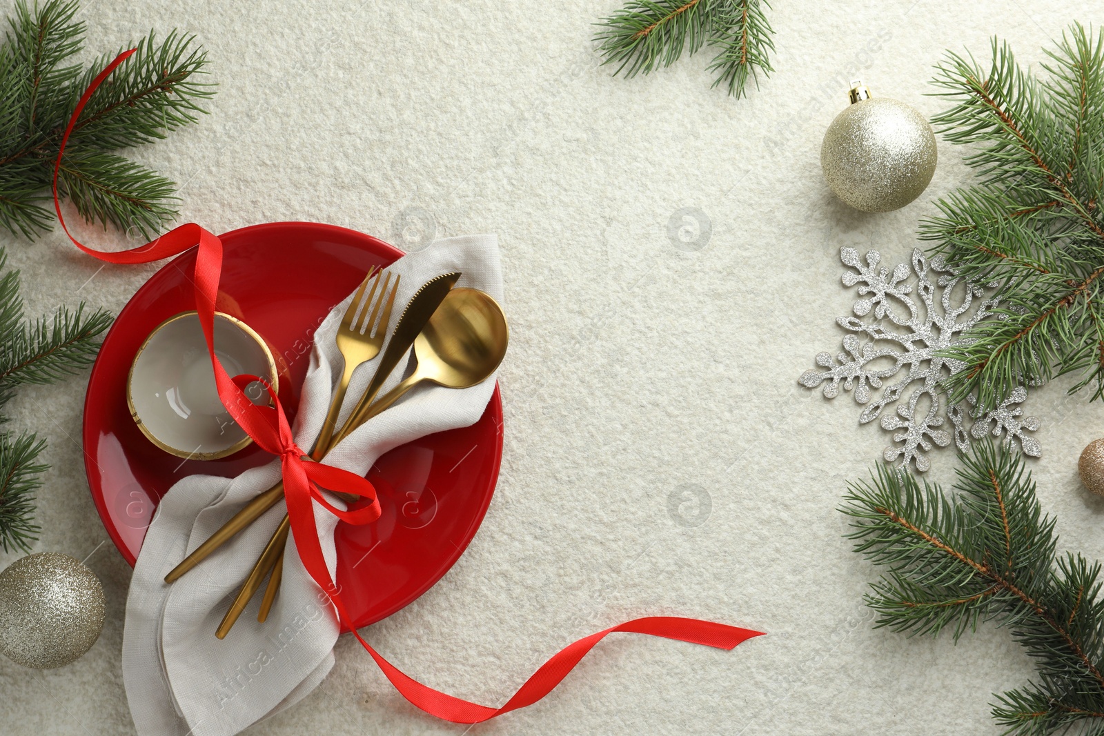 Photo of Christmas table setting with festive decor, flat lay