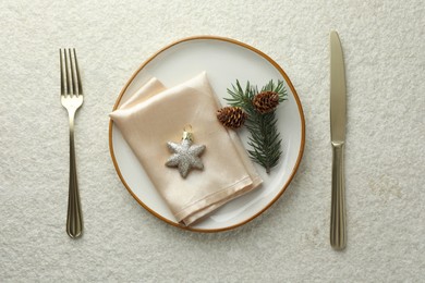 Photo of Christmas table setting with festive decor, flat lay