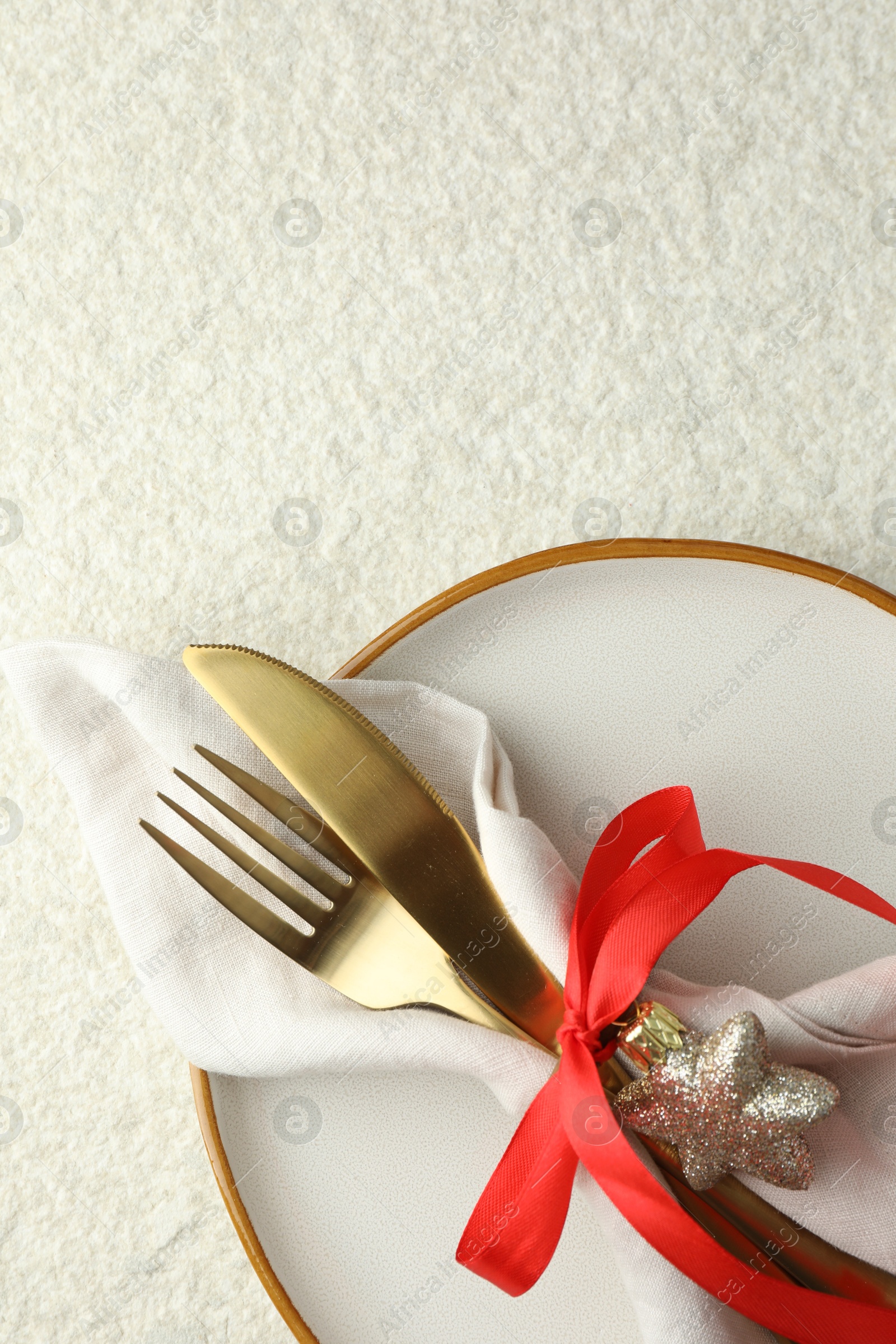 Photo of Christmas table setting with festive decor, top view