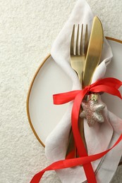 Photo of Christmas table setting with festive decor, top view