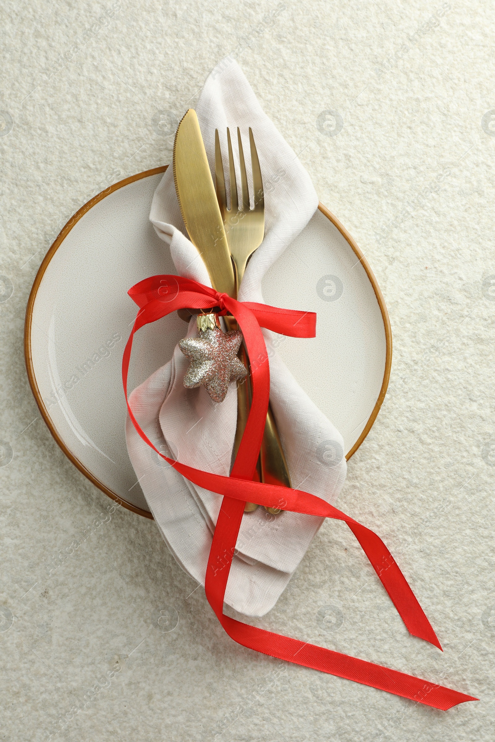 Photo of Christmas table setting with festive decor, top view