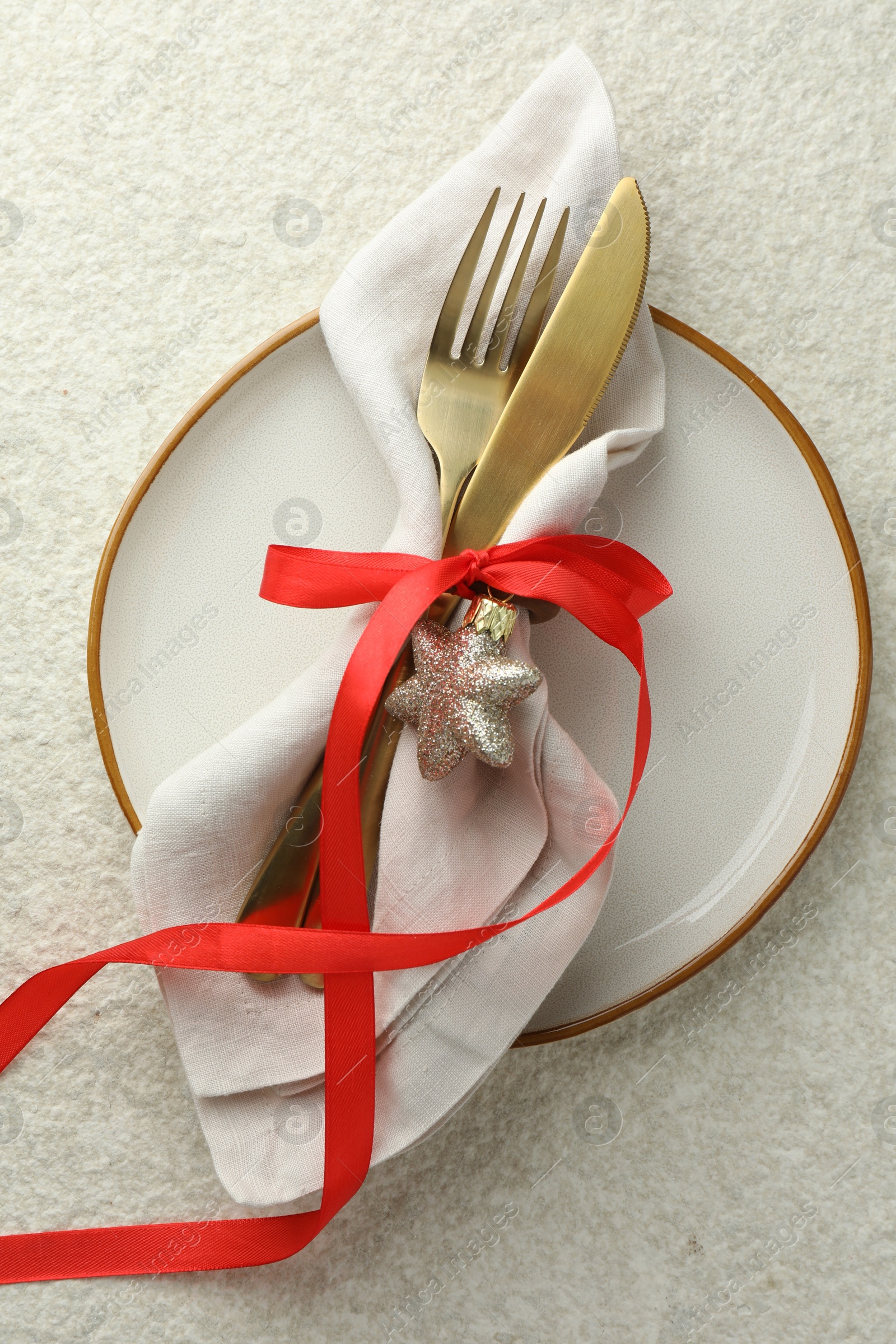 Photo of Christmas table setting with festive decor, top view