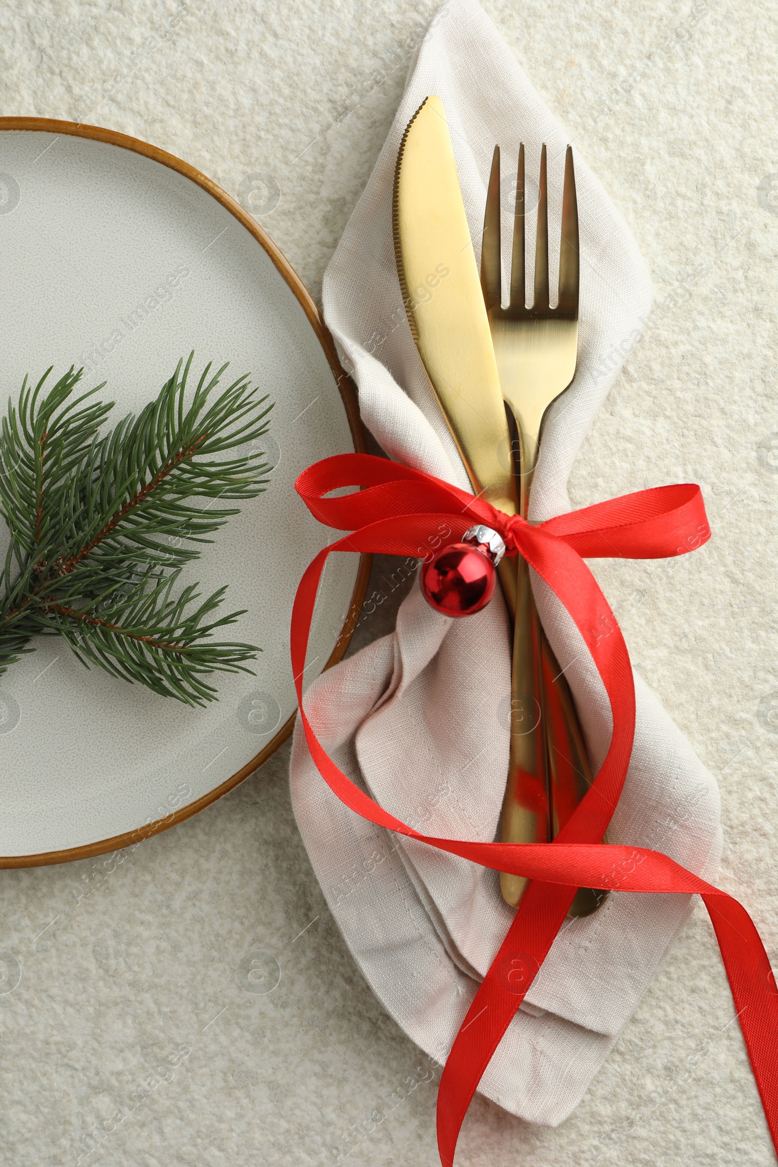 Photo of Christmas table setting with festive decor, flat lay