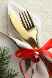 Photo of Christmas table setting with festive decor, flat lay