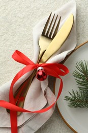 Photo of Christmas table setting with festive decor, flat lay