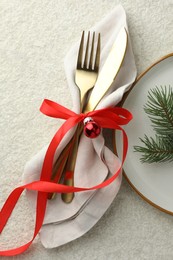 Photo of Christmas table setting with festive decor, flat lay