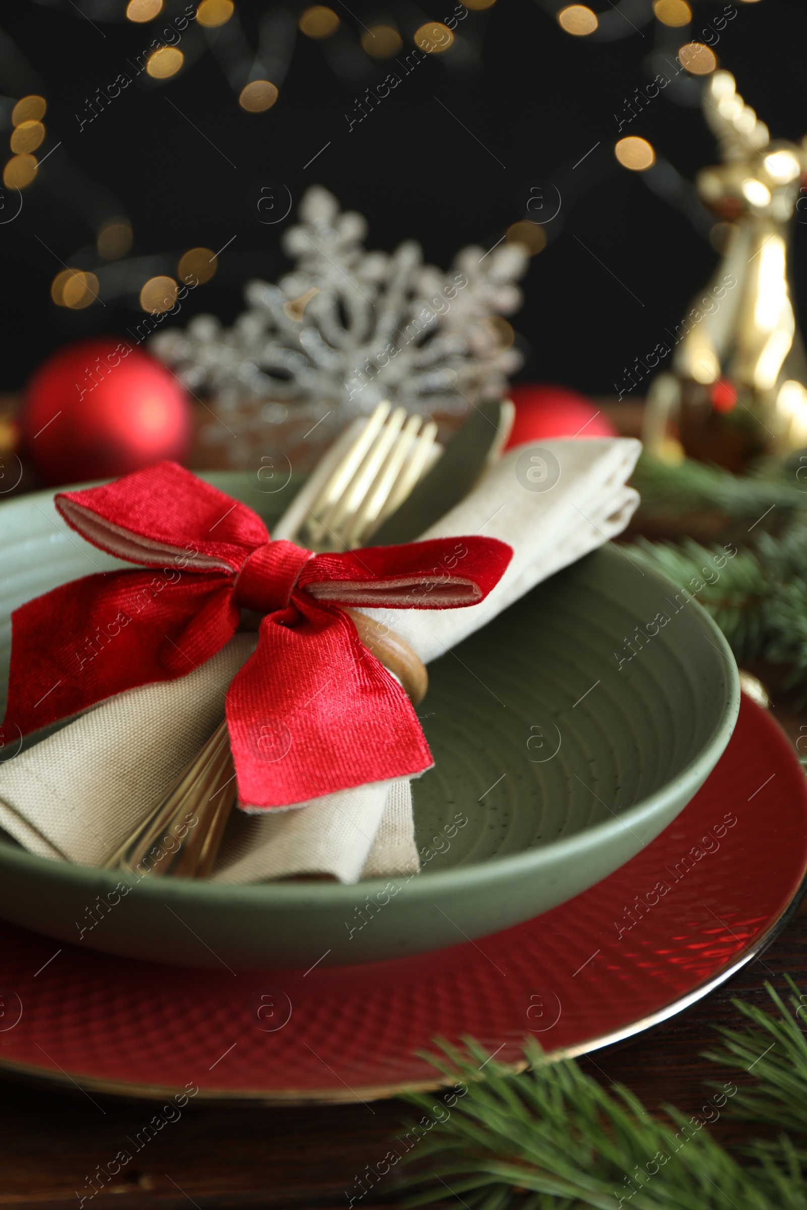 Photo of Beautiful Christmas setting on wooden table, closeup