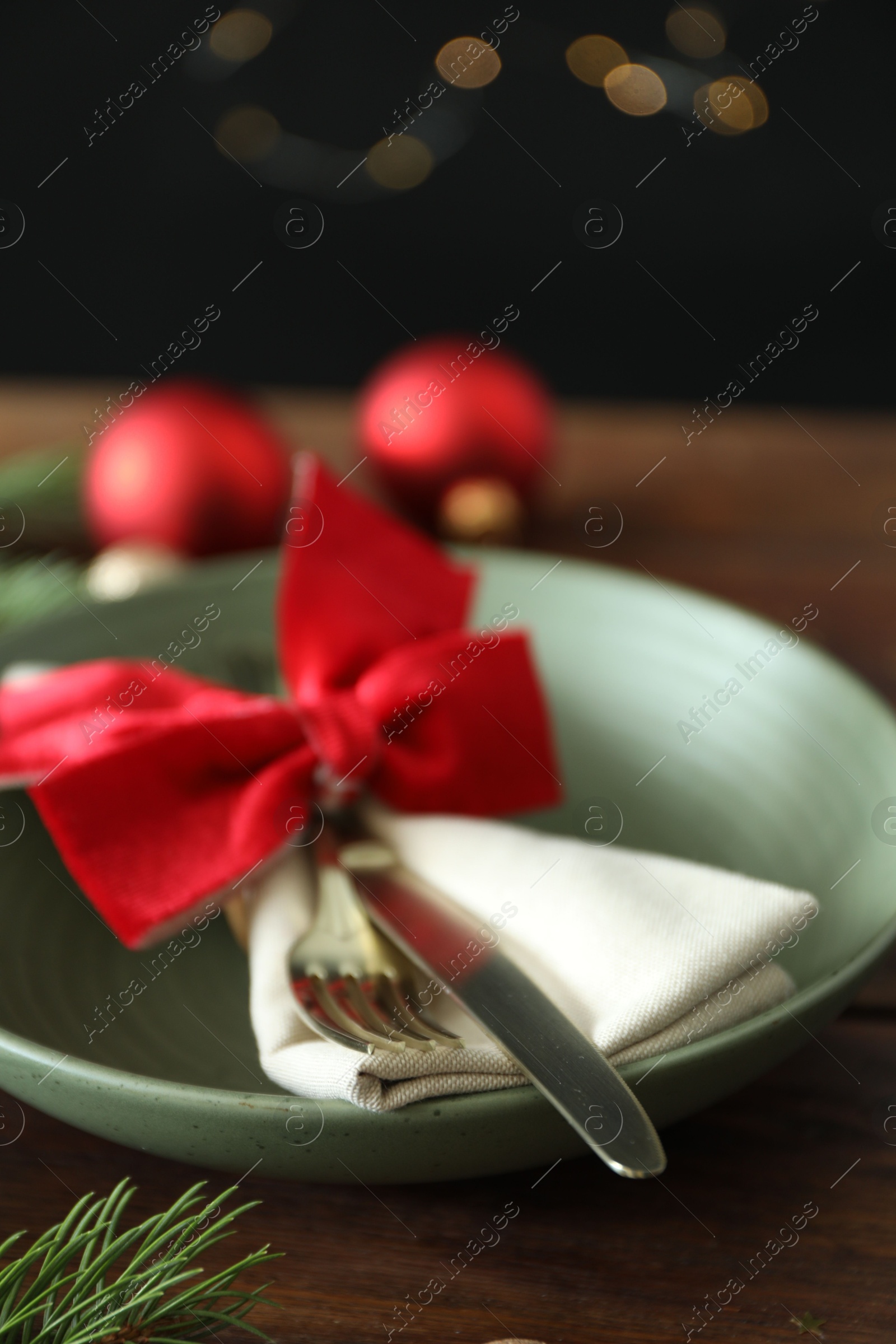 Photo of Beautiful Christmas setting on wooden table, closeup