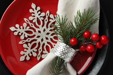 Photo of Christmas table setting with festive decor, top view