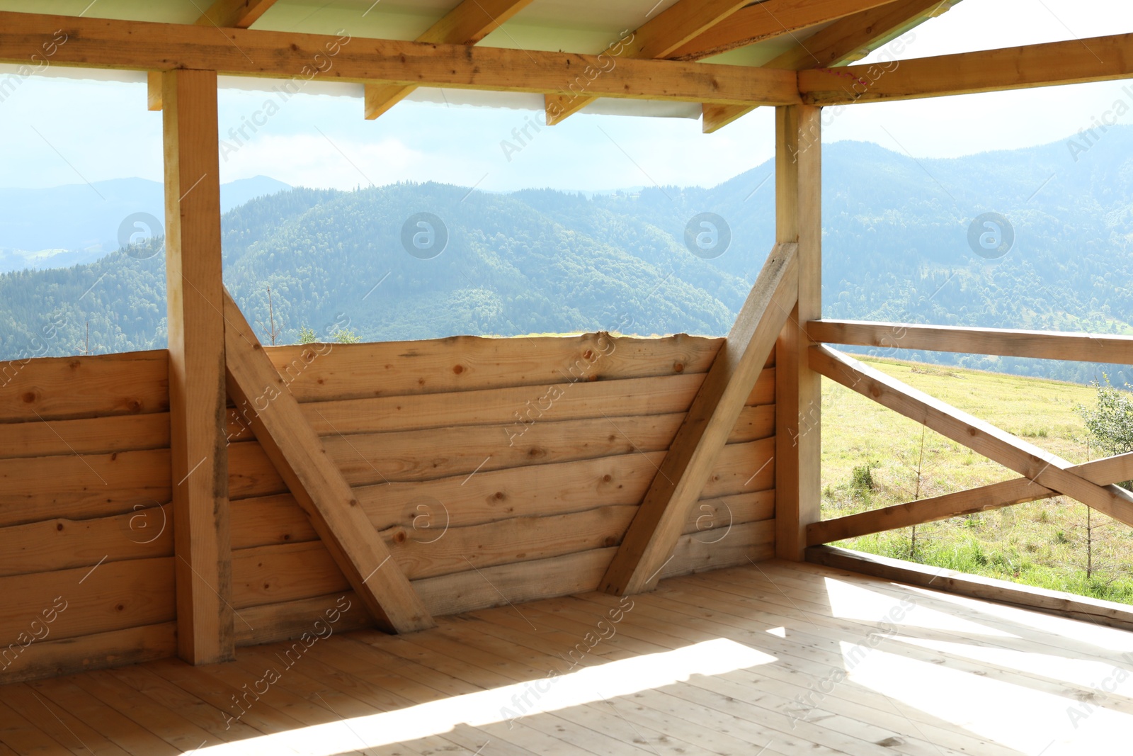 Photo of View on mountain from balcony on sunny day