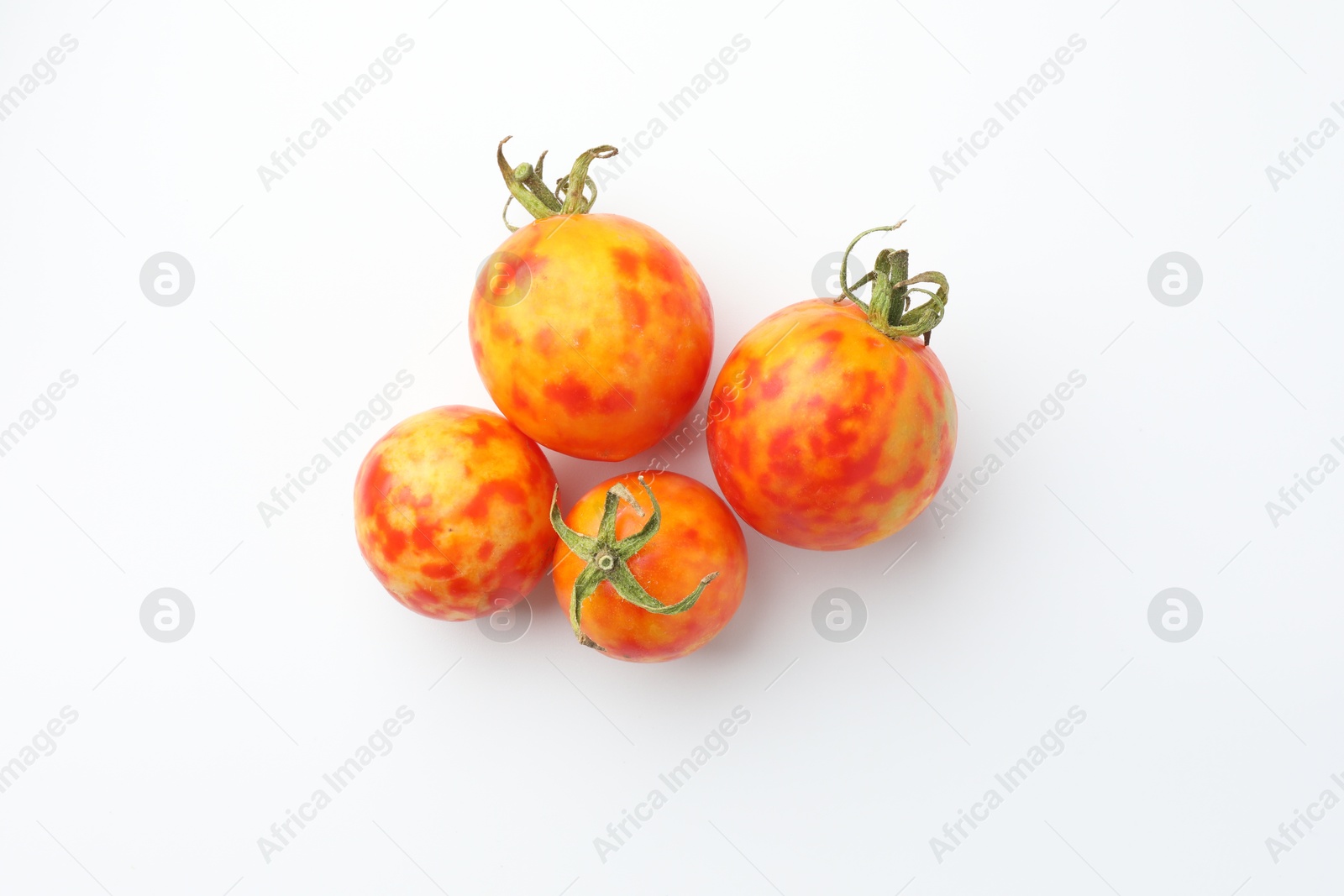 Photo of Fresh ripe tomatoes isolated on white, top view