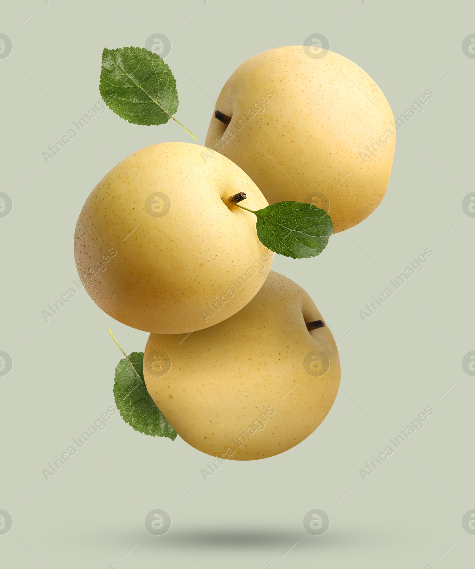 Image of Fresh apple pears falling on grey background