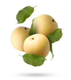 Image of Fresh apple pears and green leaves falling on white background