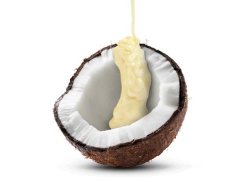 Image of Pouring melted chocolate onto coconut against white background