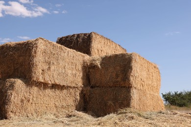 Photo of Bales of hay outdoors on sunny day