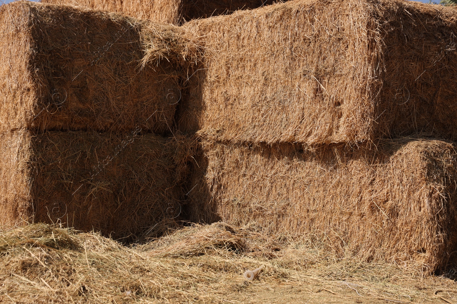 Photo of Bales of hay outdoors on sunny day, closeup