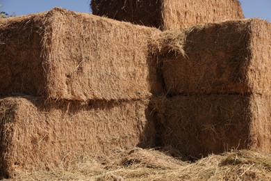 Photo of Bales of hay outdoors on sunny day, closeup