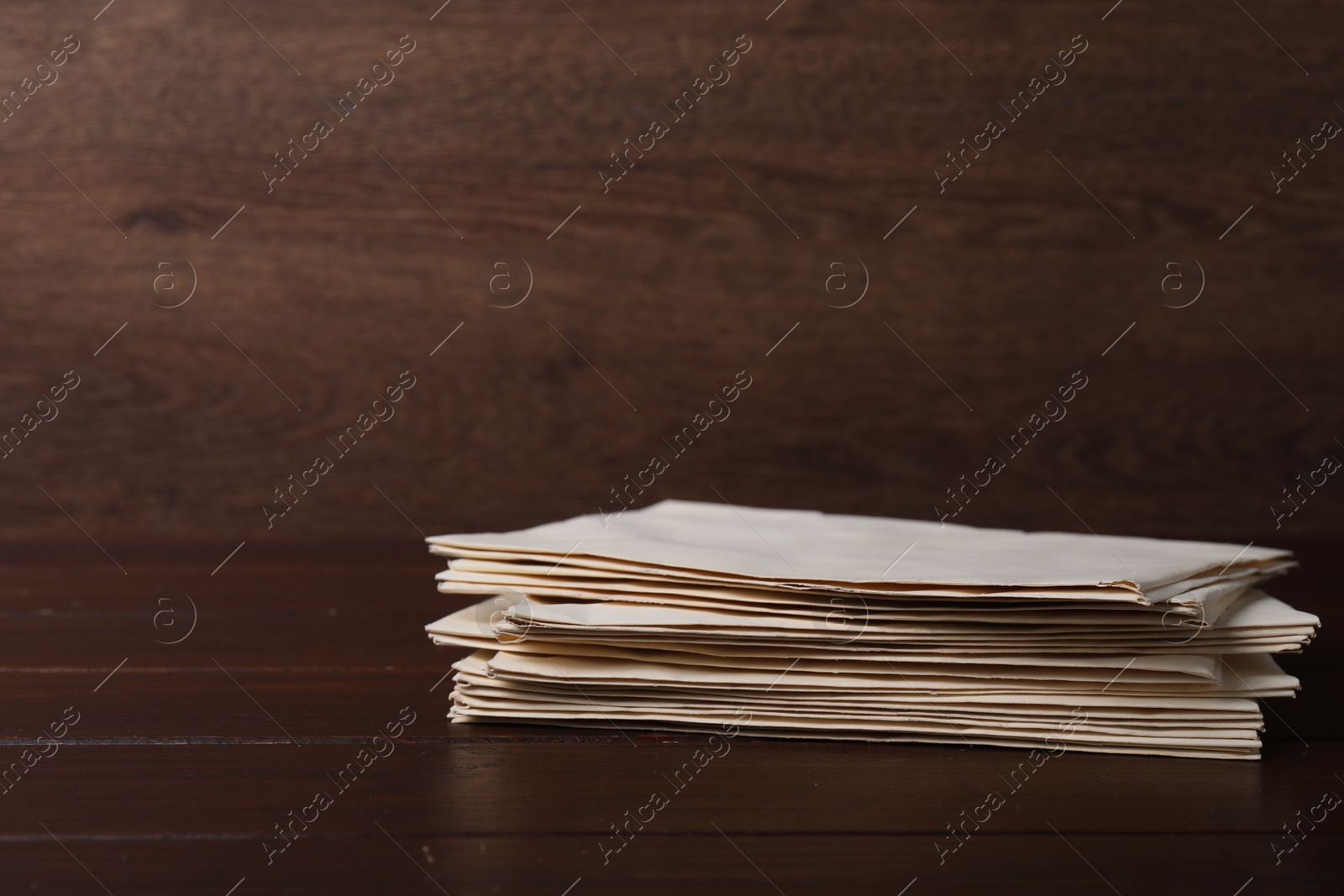 Photo of Stack of old letters on wooden table