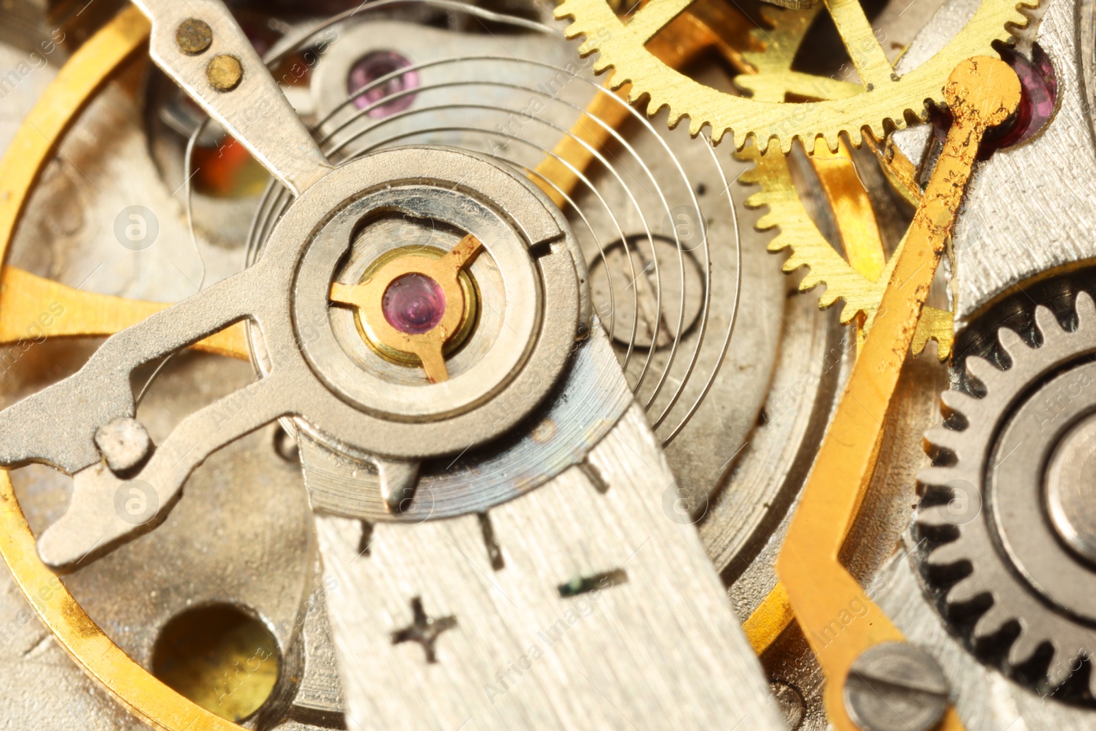 Photo of Mechanism of vintage wrist watch as background, closeup