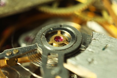 Photo of Mechanism of vintage wrist watch as background, closeup