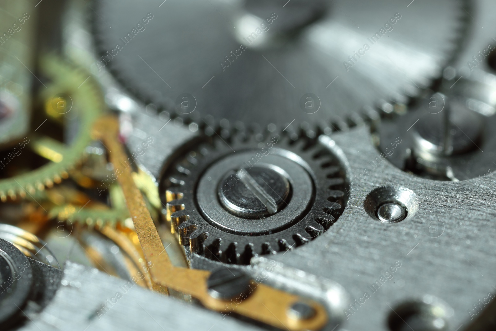 Photo of Mechanism of vintage wrist watch as background, closeup