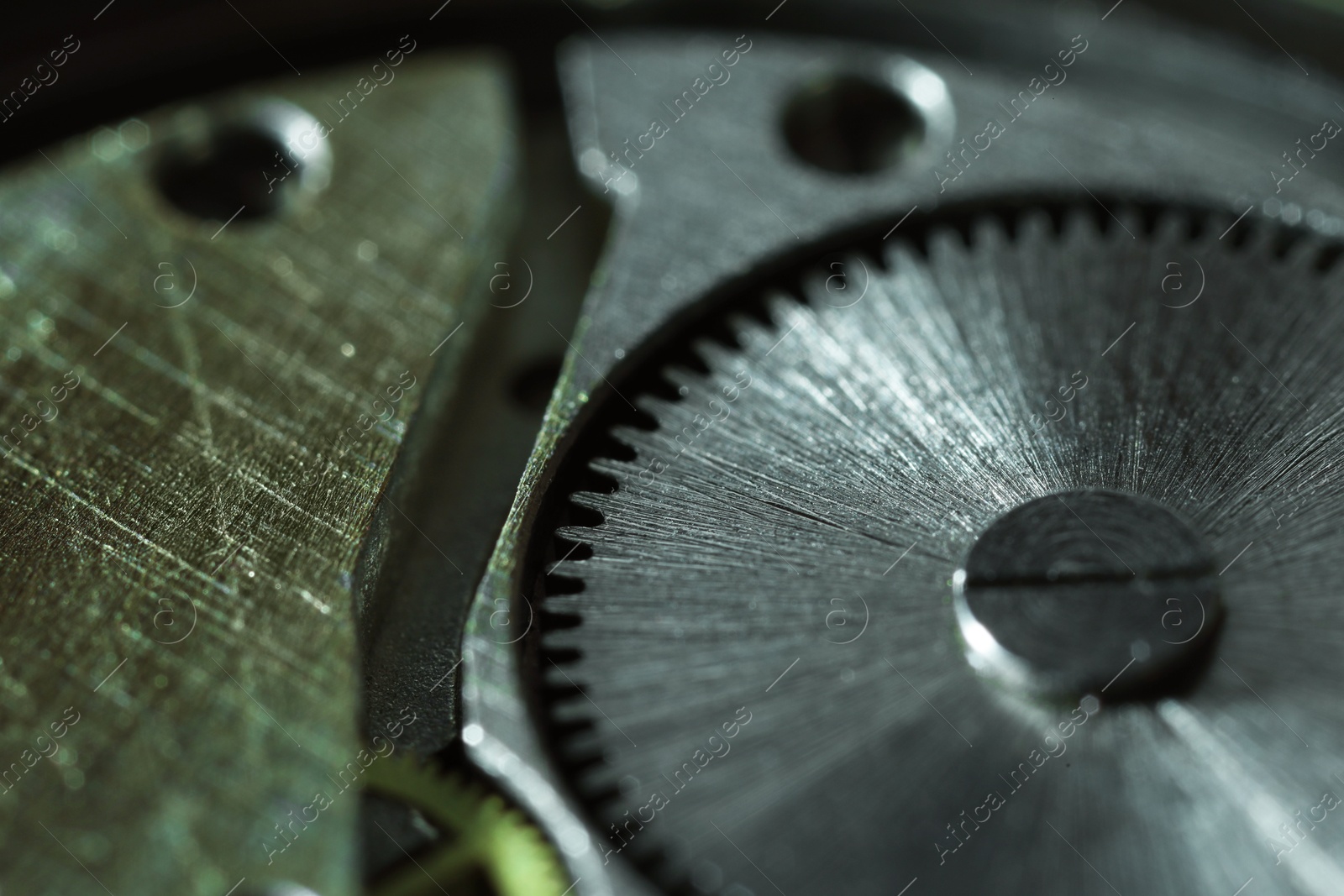 Photo of Mechanism of vintage wrist watch as background, closeup