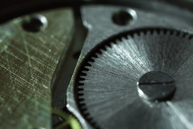 Photo of Mechanism of vintage wrist watch as background, closeup