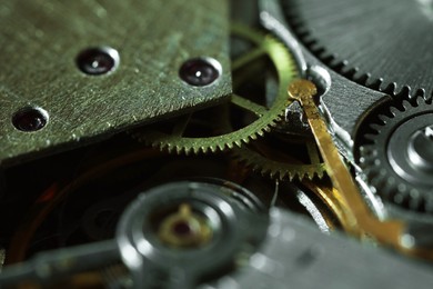 Photo of Mechanism of vintage wrist watch as background, closeup