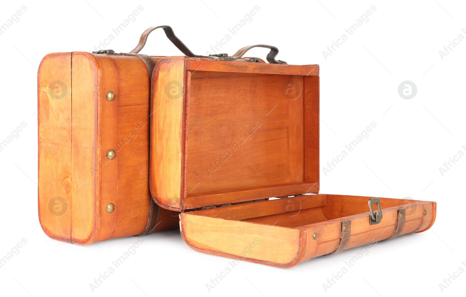 Photo of Two new wooden suitcases isolated on white