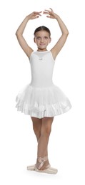 Photo of Little ballerina practicing dance moves on white background