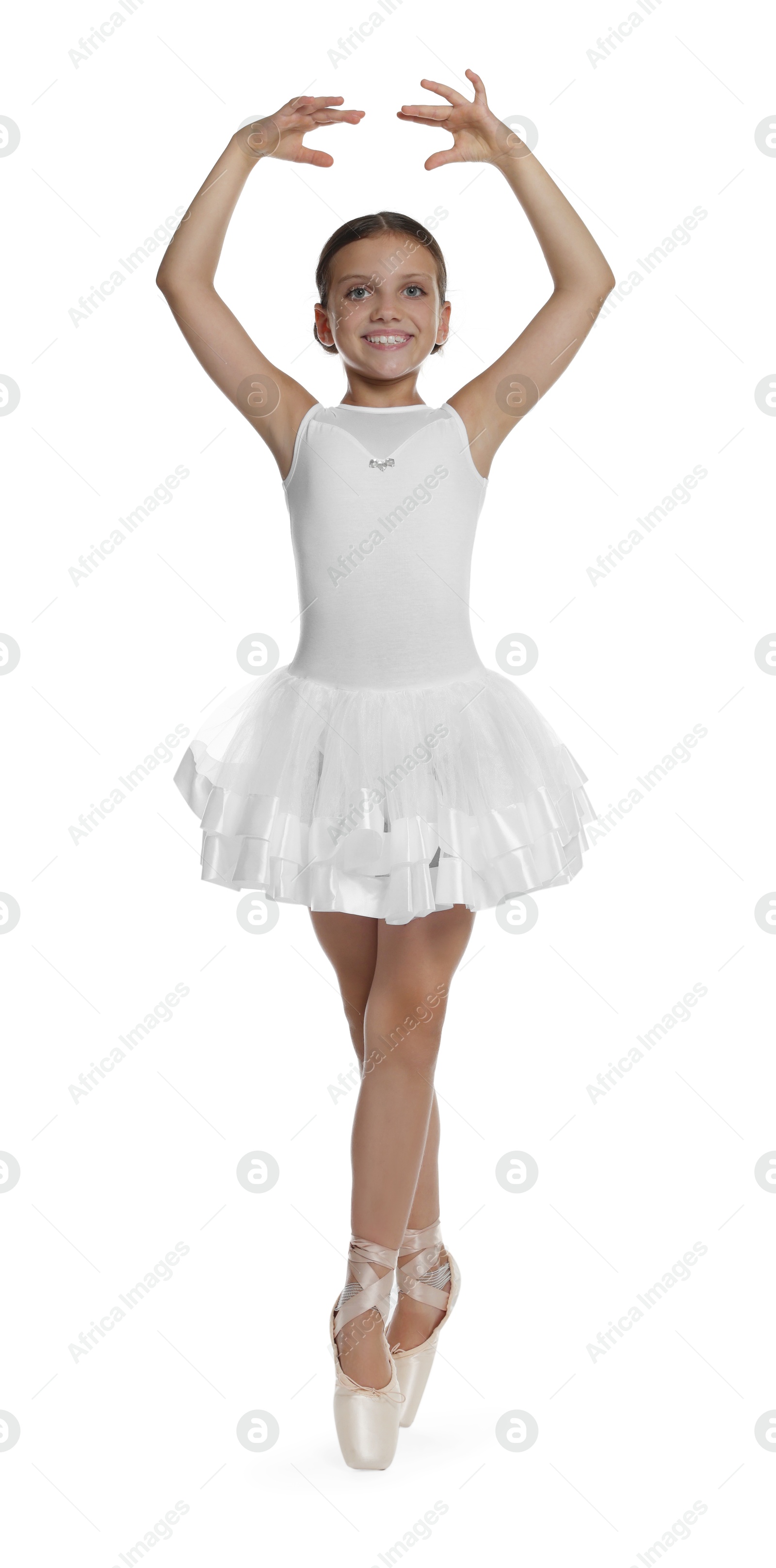 Photo of Little ballerina practicing dance moves on white background