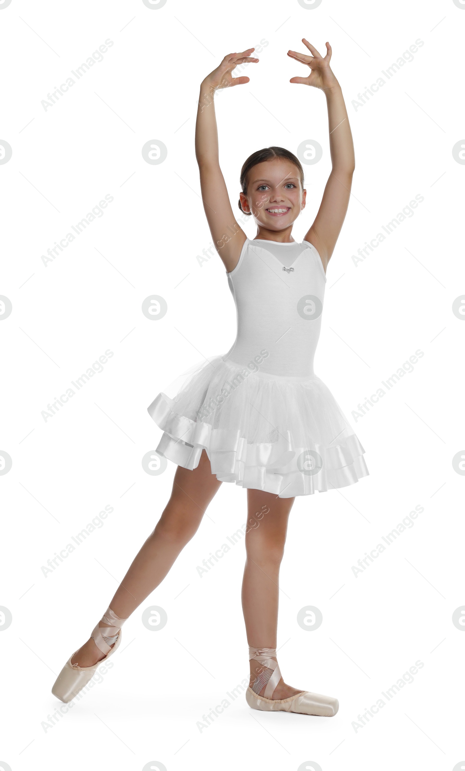 Photo of Little ballerina practicing dance moves on white background