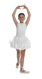 Photo of Little ballerina practicing dance moves on white background