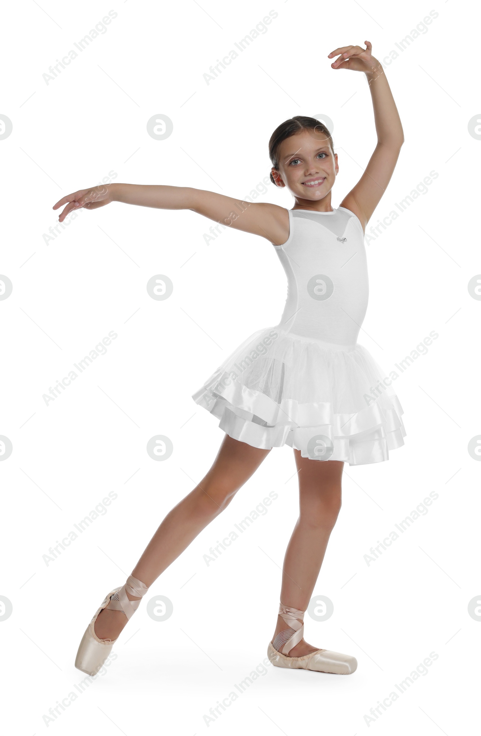 Photo of Little ballerina practicing dance moves on white background