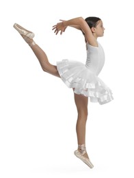 Photo of Cute little ballerina dancing on white background