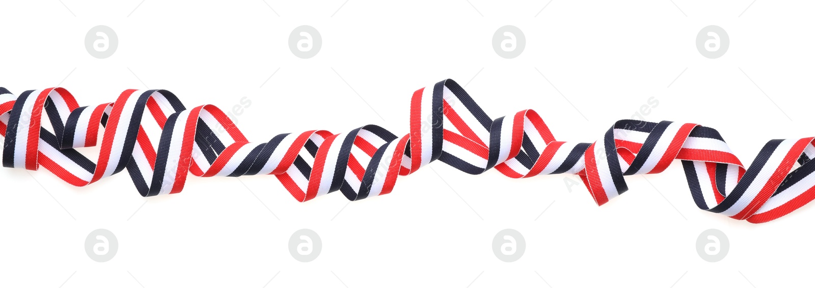 Photo of Ribbon in colors of Yemeni flag isolated on white, top view