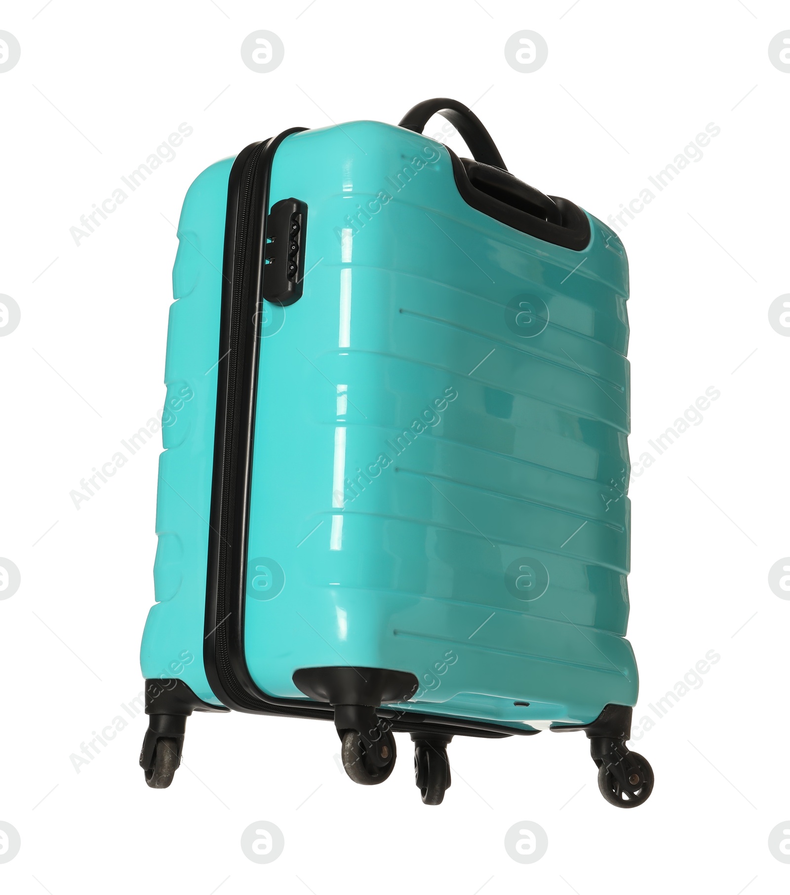 Photo of One new turquoise suitcase isolated on white