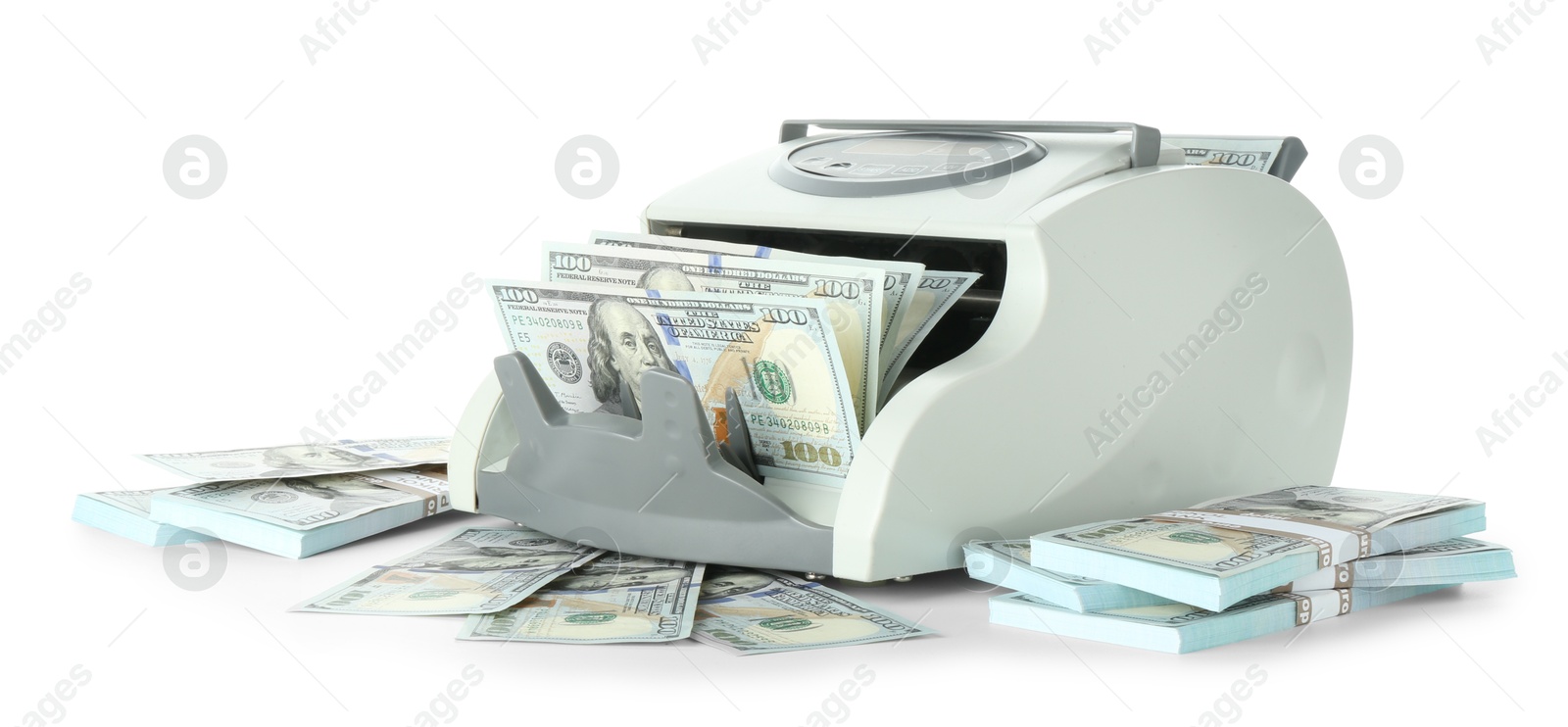 Photo of Money counter machine and dollar banknotes isolated on white