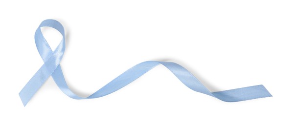 Photo of Light blue ribbon isolated on white, top view. Prostate cancer awareness